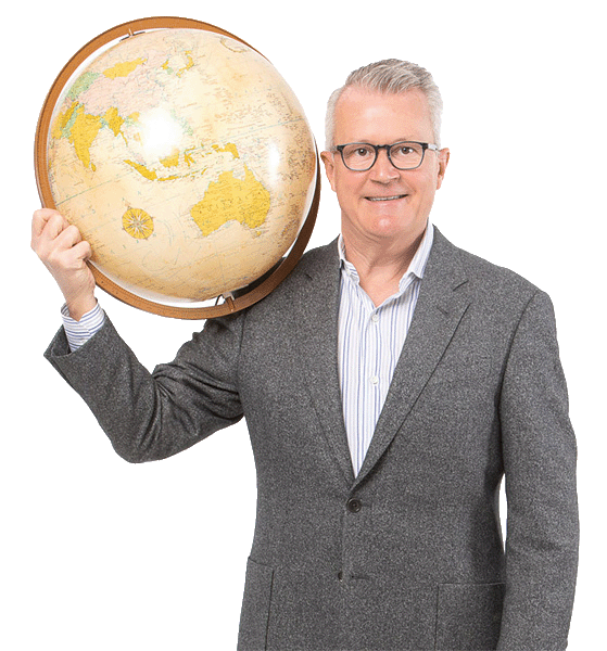 Tim Andrews holding globe